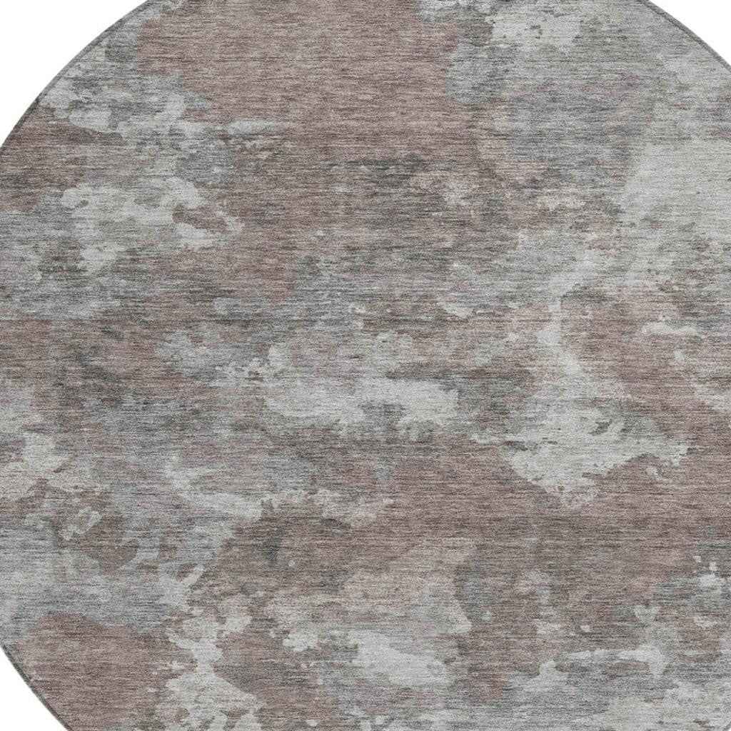 8' Brown And Ivory Round Abstract Washable Indoor Outdoor Area Rug