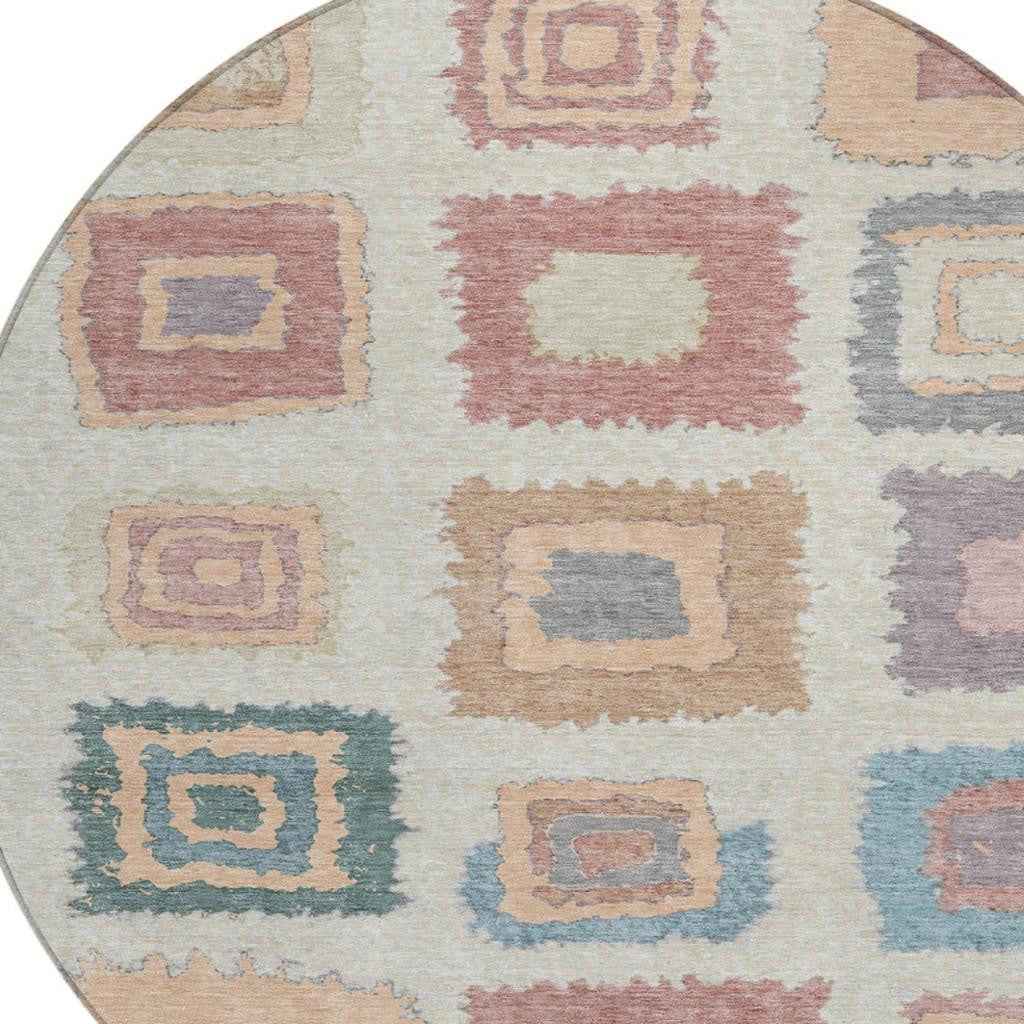 8' Peach Ivory And Beige Round Geometric Washable Indoor Outdoor Area Rug