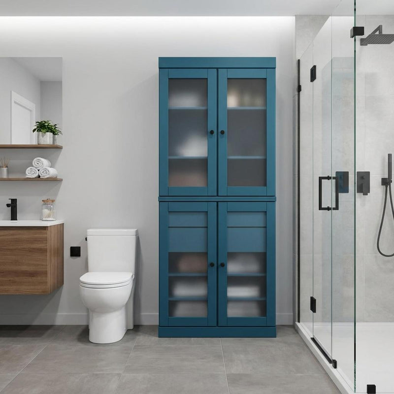 Teal blue wood linen cabinet with glass doors and lower drawers; four interior shelves