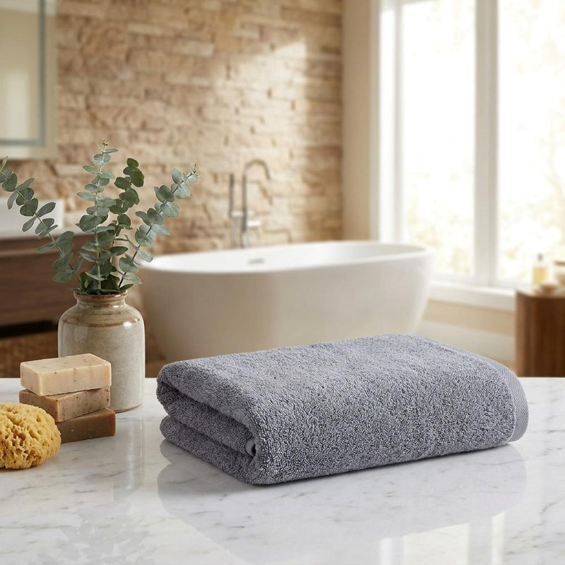 Light gray Turkish cotton hand towels, 16x30 in, folded terry on countertop