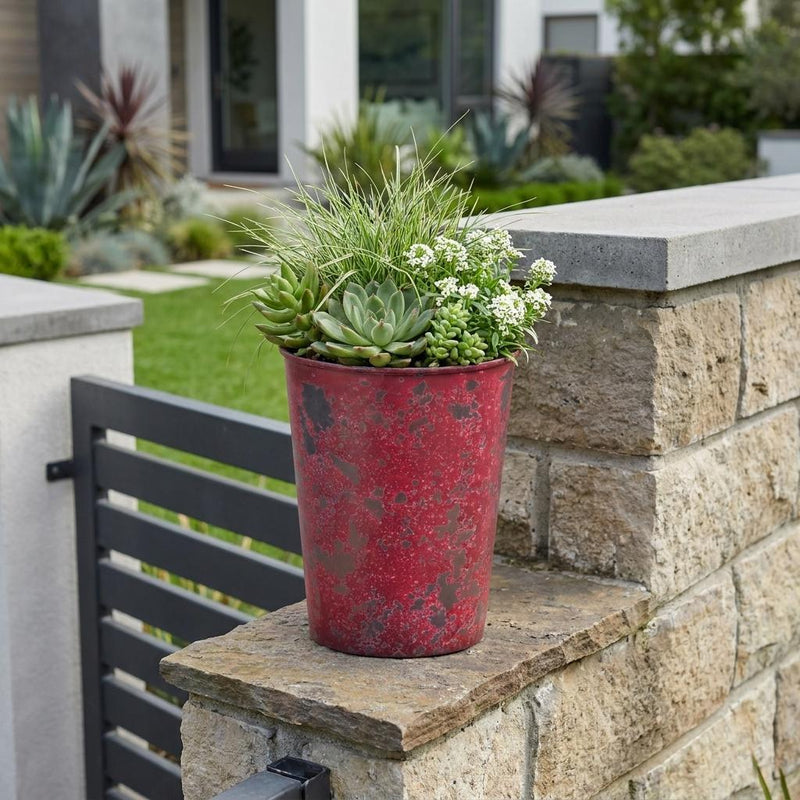 Red speckled round plastic planter with succulents, 5 in size