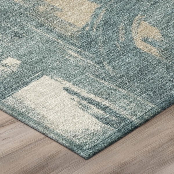 Abstract area rug with teal and turquoise distressed pattern, light cream highlights