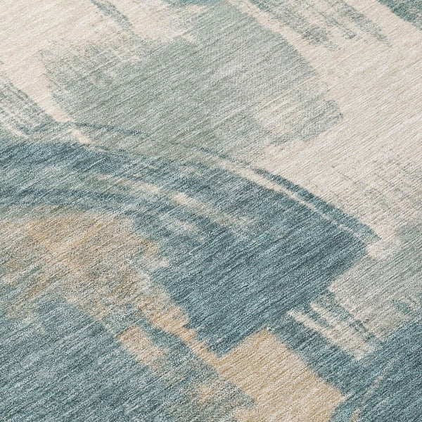 Teal and cream abstract washable area rug with distressed striated design
