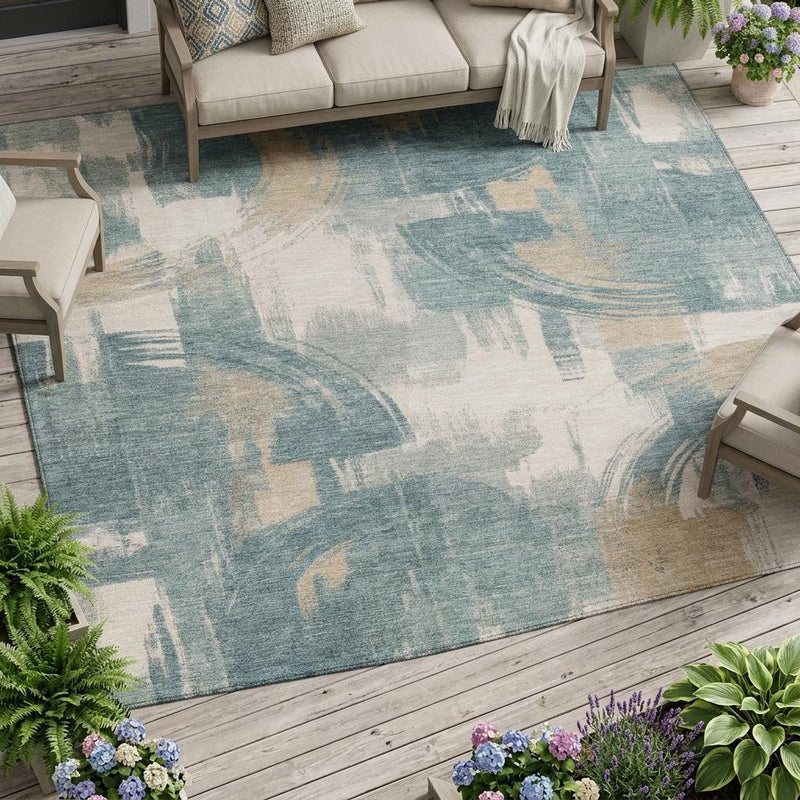Turquoise and teal abstract area rug with distressed off-white and beige highlights