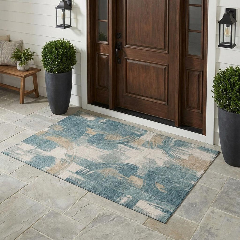 Abstract area rug with turquoise and teal blue distressed abstract pattern