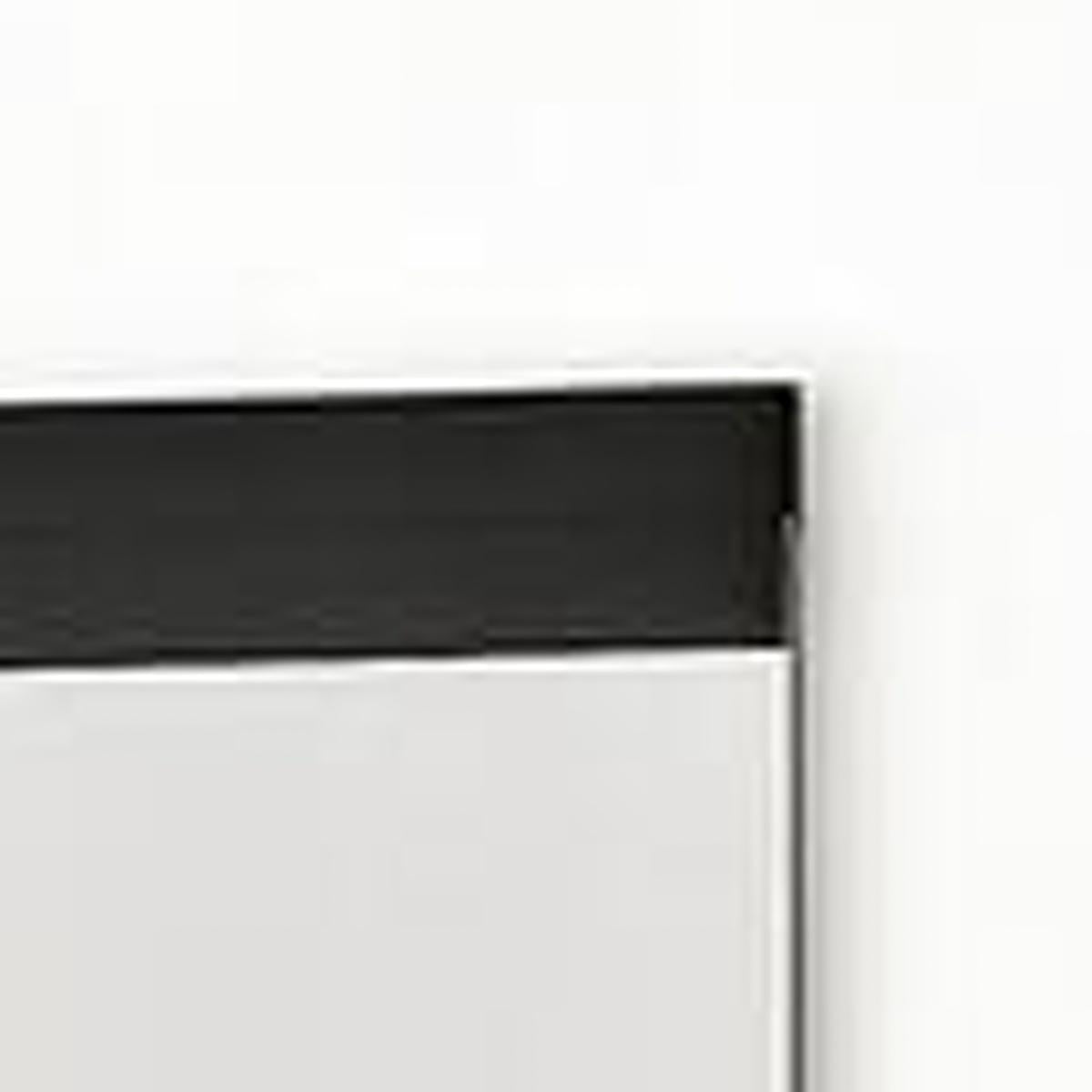 Frameless full-length hanging mirror with slim dark edge and clear glass