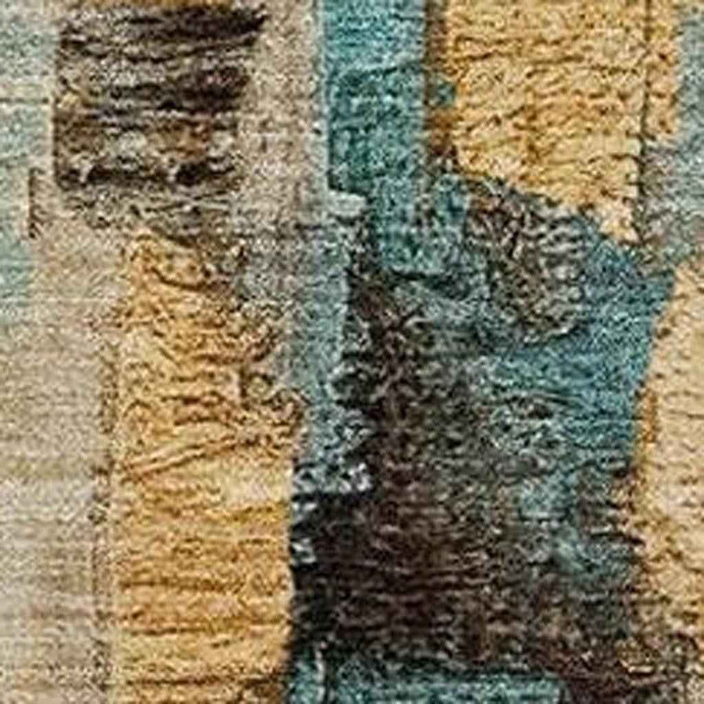 9' X 12' Beige And Teal Blue Abstract Washable Indoor Outdoor Area Rug