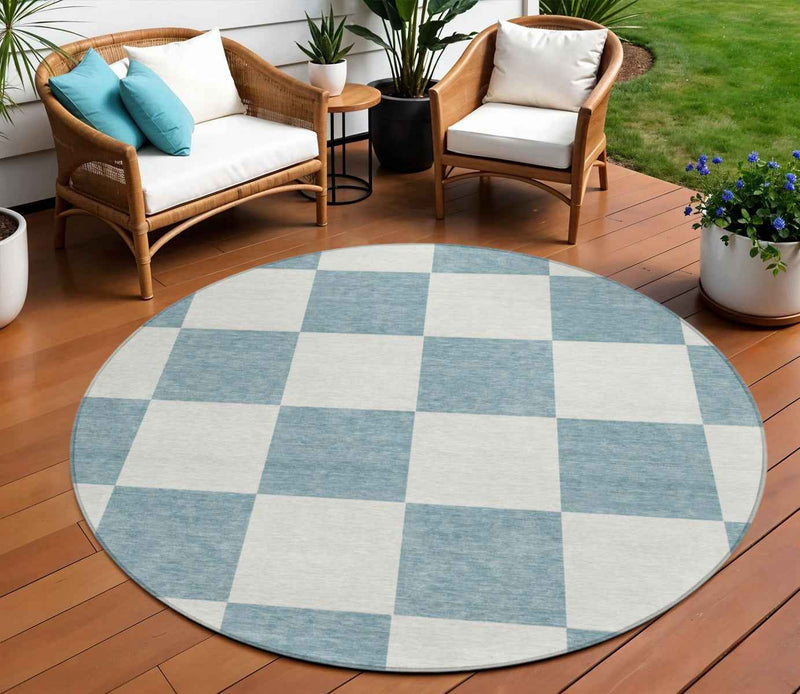 8' Teal Blue And Ivory Round Geometric Washable Indoor Outdoor Area Rug