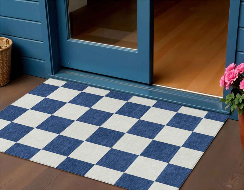 3' X 5' Navy Blue And Ivory Geometric Washable Indoor Outdoor Area Rug
