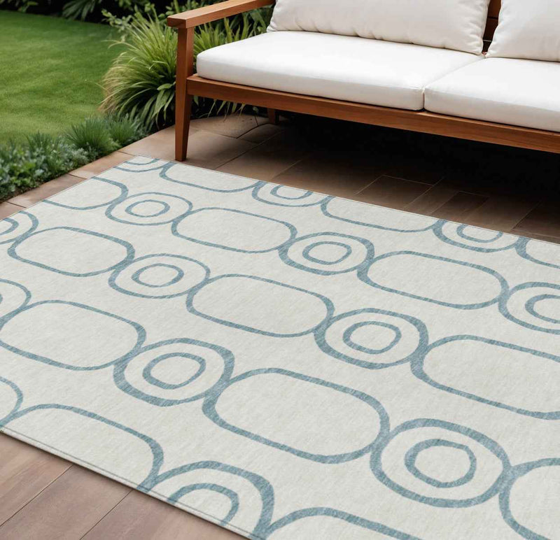 10' X 14' Teal Blue And Ivory Geometric Washable Indoor Outdoor Area Rug