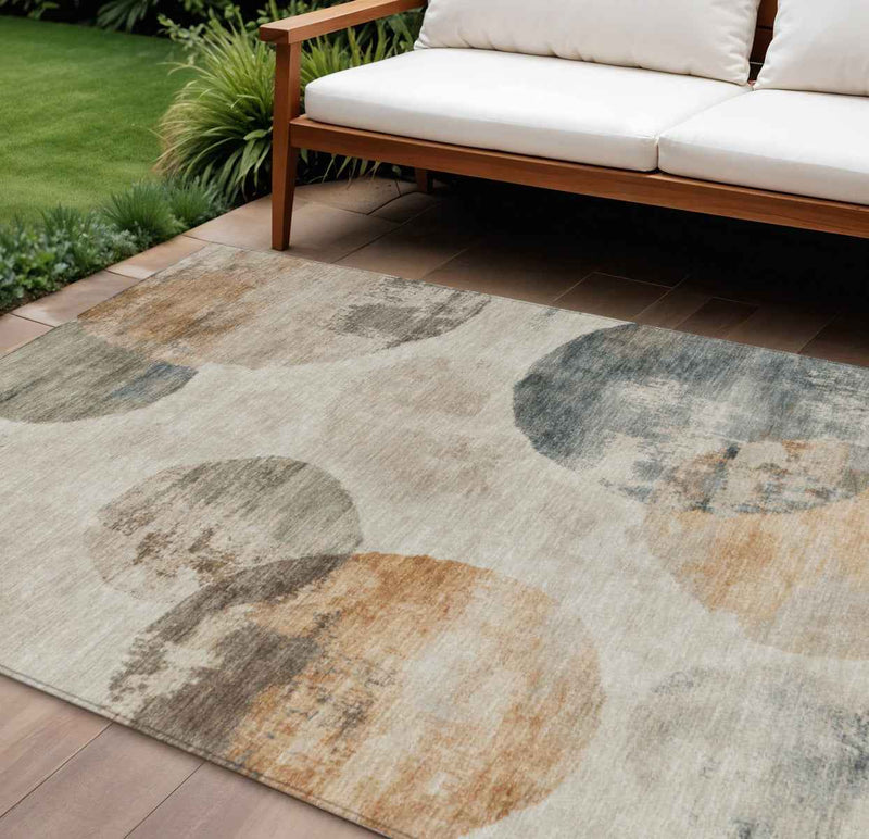 9' X 12' Beige Khaki And Ivory Abstract Washable Indoor Outdoor Area Rug