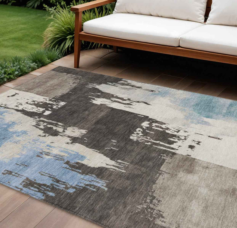 8' X 10' Brown Ivory And Blue Abstract Washable Indoor Outdoor Area Rug