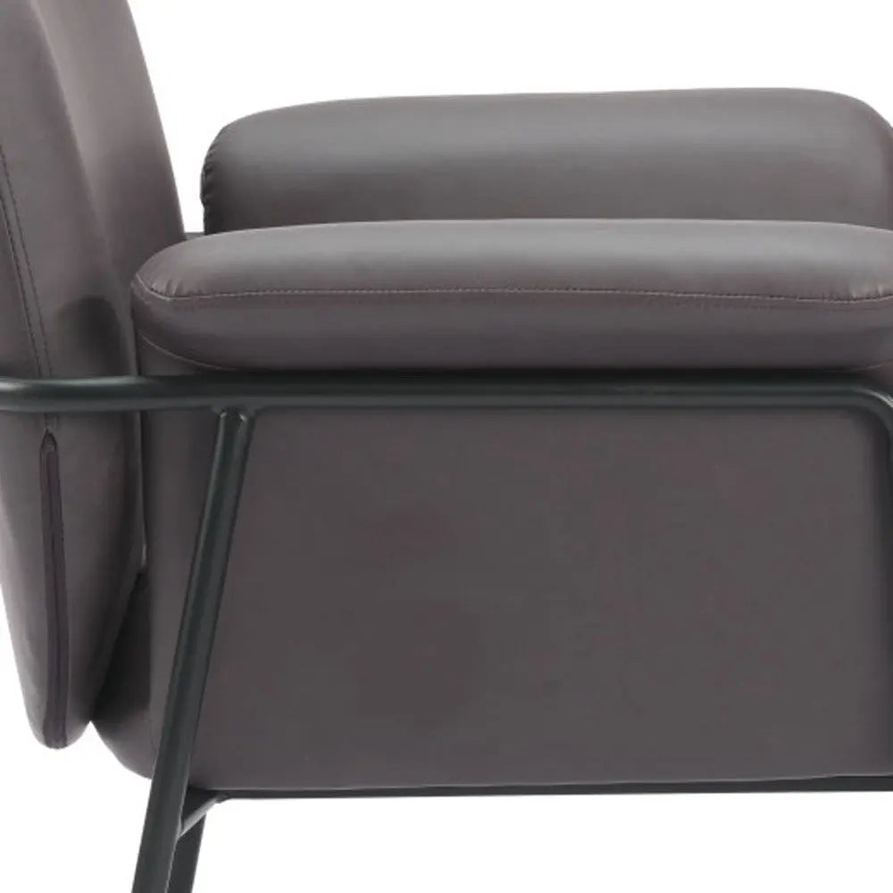 Modern gray leather armchair with sleek metal frame and plush cushions, ideal for contemporary interiors.