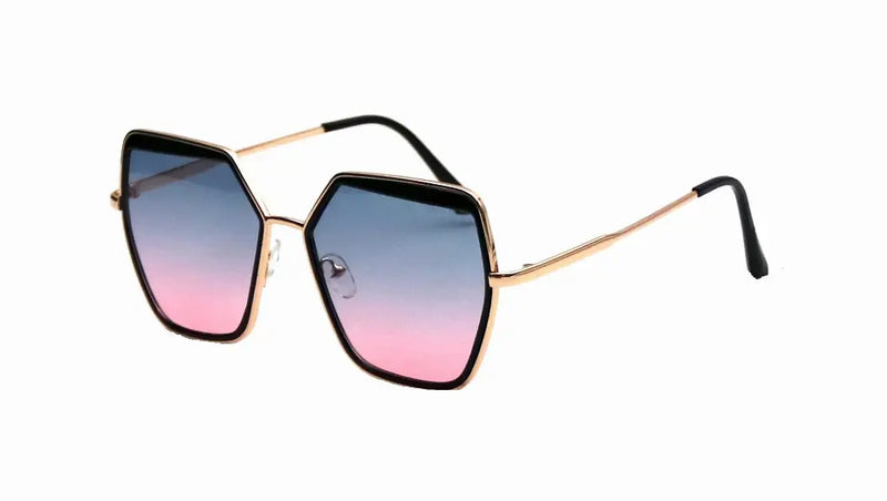Oversized gold frame sunglasses with gradient pink-blue lenses and sleek black temple tips. Stylish and modern accessory.