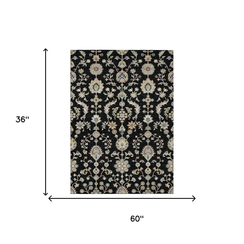 Black floral area rug, 60" x 36", intricate design with blue, cream, and gold accents, elegant for any decor.