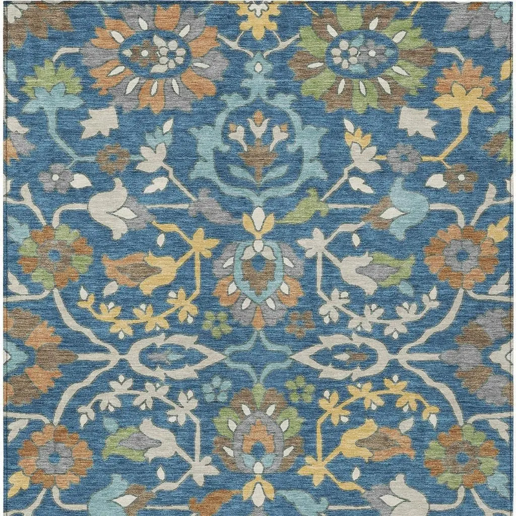 Blue floral area rug featuring intricate patterns and a soft, textured finish, perfect for modern and vintage decor.