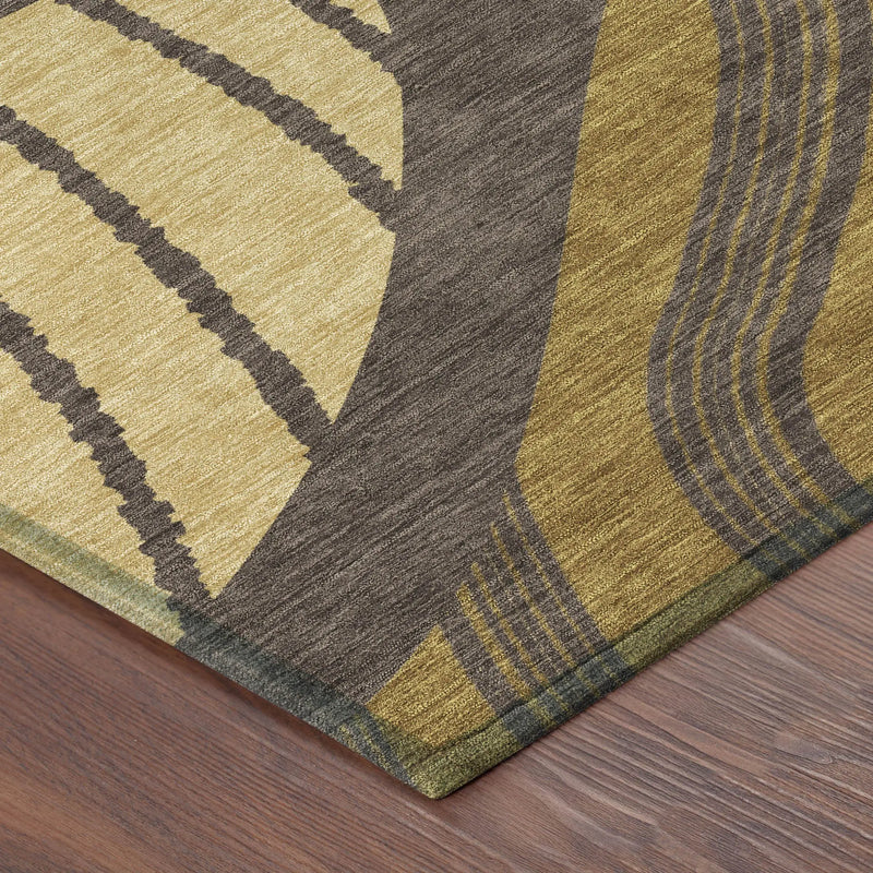 Abstract gold and gray area rug, featuring a modern geometric design, ideal for contemporary home decor.