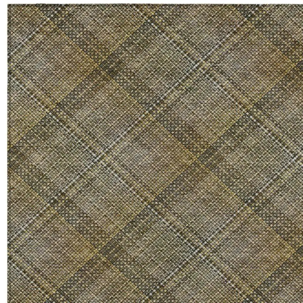 Brown and beige plaid fabric with a textured weave, ideal for upholstery or home decor projects.