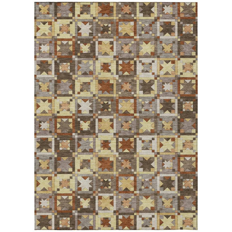 Multicolored geometric pattern area rug made of soft, durable fibers in warm tones of brown, beige, and yellow.