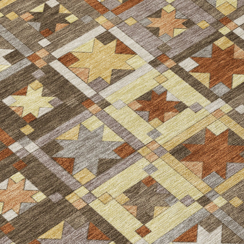 Geometric star-patterned area rug in warm tones of brown, yellow, and gray, soft plush material suitable for modern homes.
