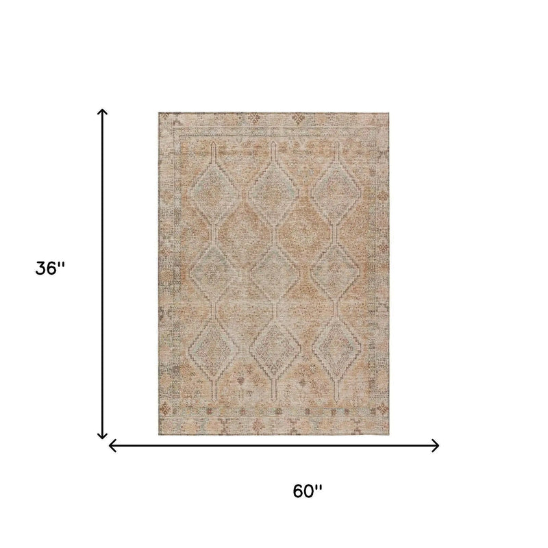 Tan geometric patterned area rug, 36" x 60", vintage style, soft woven fabric, perfect for living rooms or bedrooms.