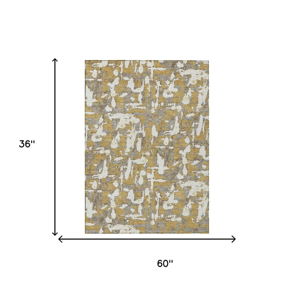 3' X 5' Gold And Ivory Abstract Washable Indoor Outdoor Area Rug Homeroots Outdoor