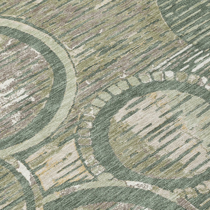 Multicolored abstract area rug in green, beige, and lavender; plush texture with circular patterns for modern decor.