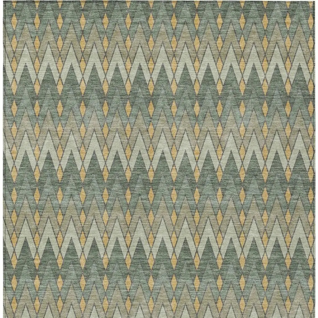 Geo-patterned area rug in muted greens, beige, and gold, featuring a modern diamond design, perfect for contemporary decor.