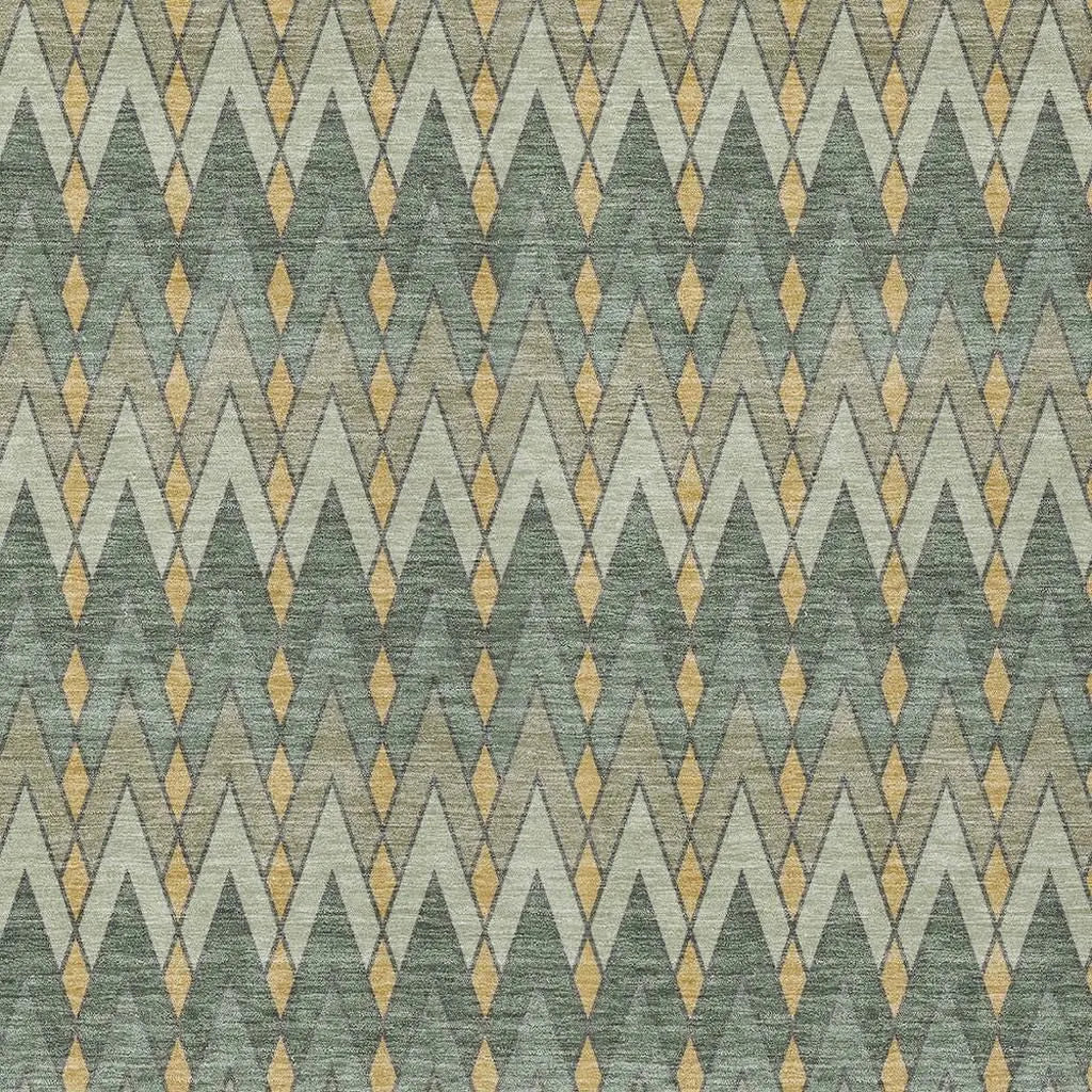 Geometric green and gold patterned fabric with zigzag design, perfect for upholstery or home decor projects.
