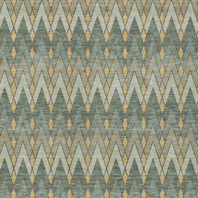Geometric green and gold patterned fabric with zigzag design, perfect for upholstery or home decor projects.