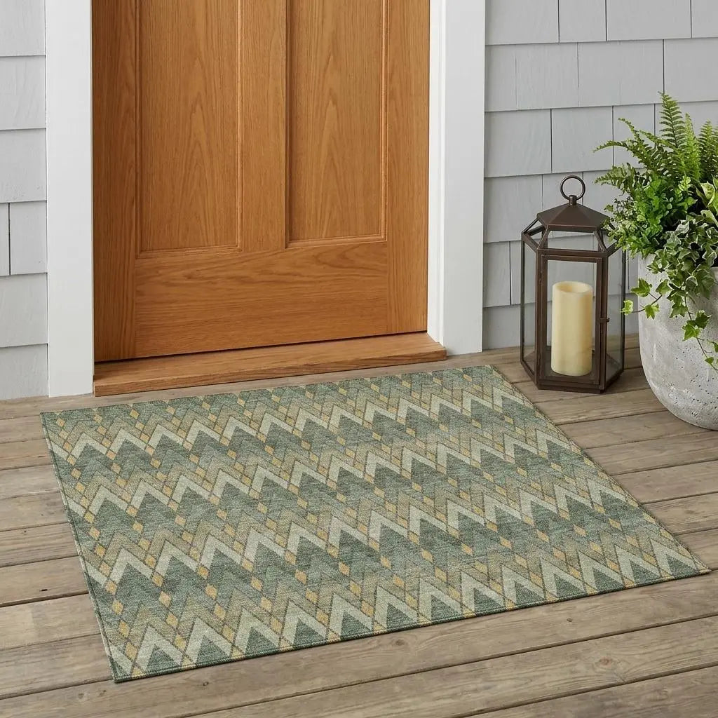 Blue and tan geometric patterned outdoor rug, made of durable material, ideal for entryways or porches.