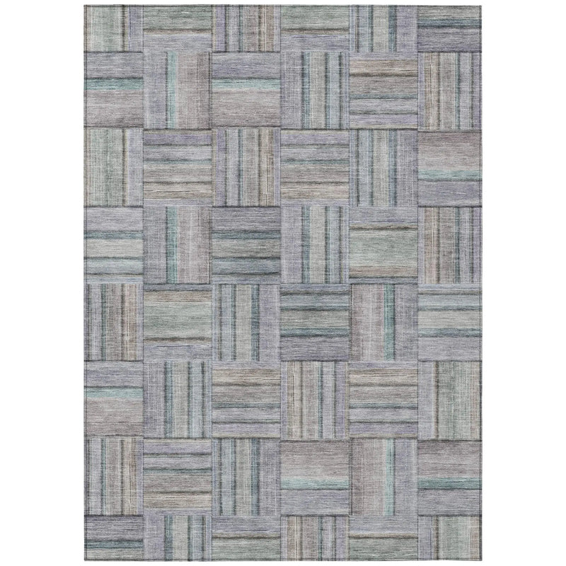 Gray and blue geometric patterned area rug, featuring a soft, textured weave for modern home decor.