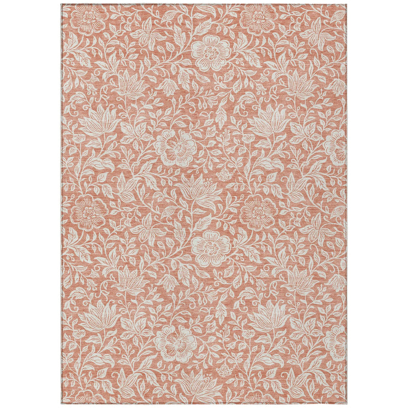 Terra-cotta floral area rug with white botanical pattern, crafted from durable, soft synthetic fibers.