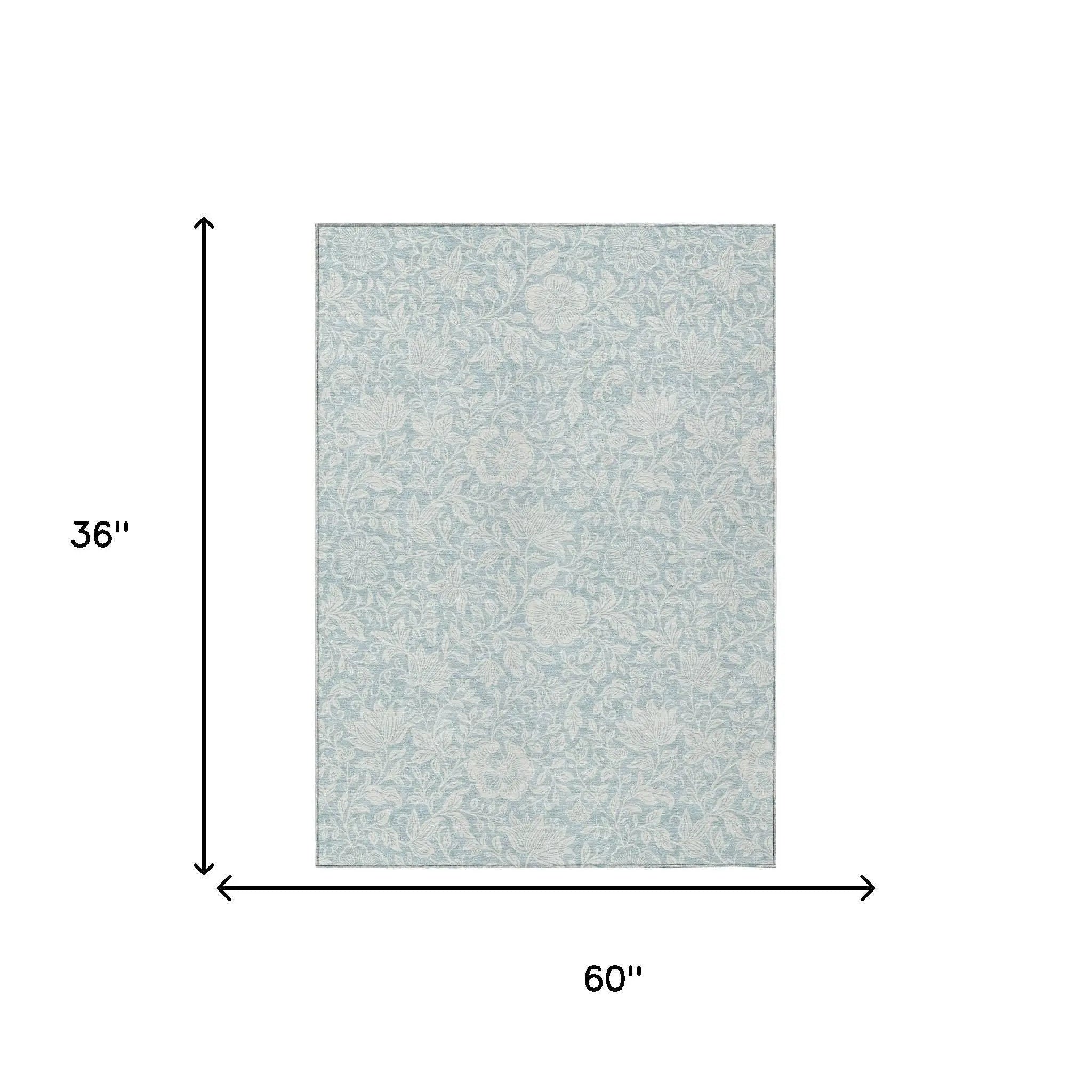 Light blue floral area rug, 60"x36", soft polyester material, stylish for modern or vintage decor.