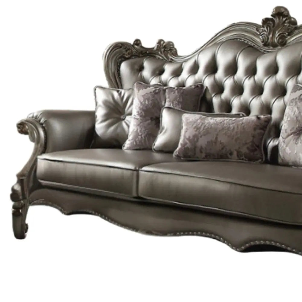 46" Platinum Faux Leather Curved Sofa And Toss Pillows Homeroots Living Room