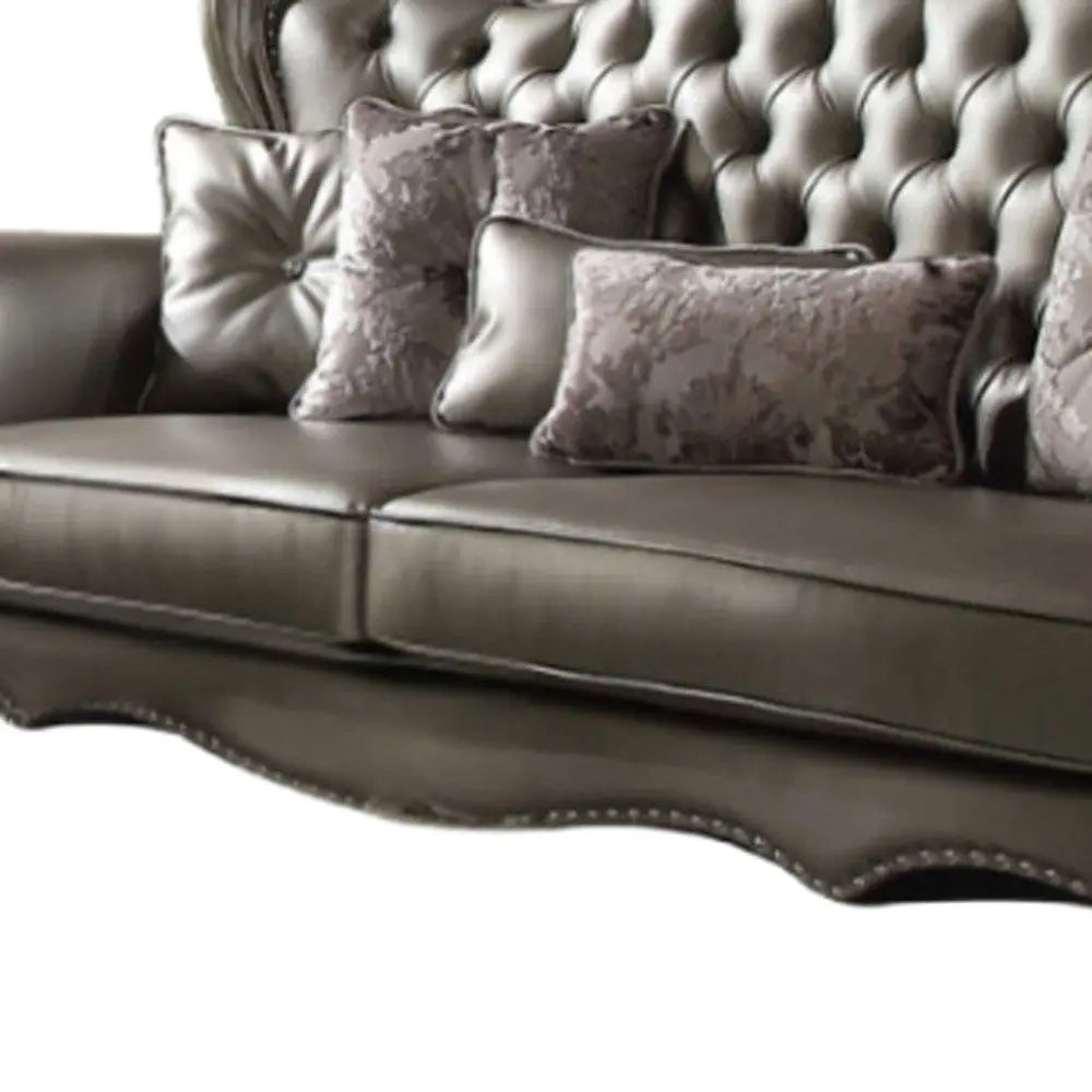 46" Platinum Faux Leather Curved Sofa And Toss Pillows Homeroots Living Room