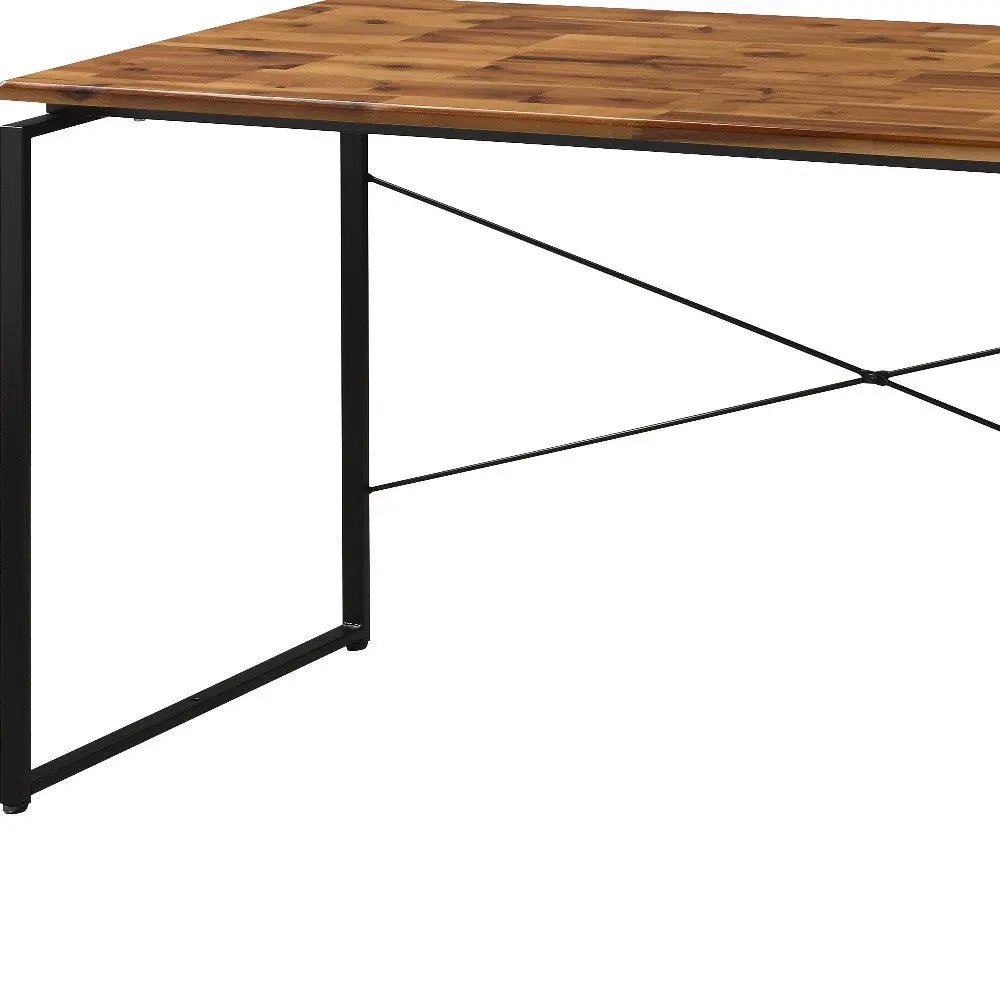 Modern rectangular dining table with a walnut wood top and black metal legs, featuring a stylish geometric design.