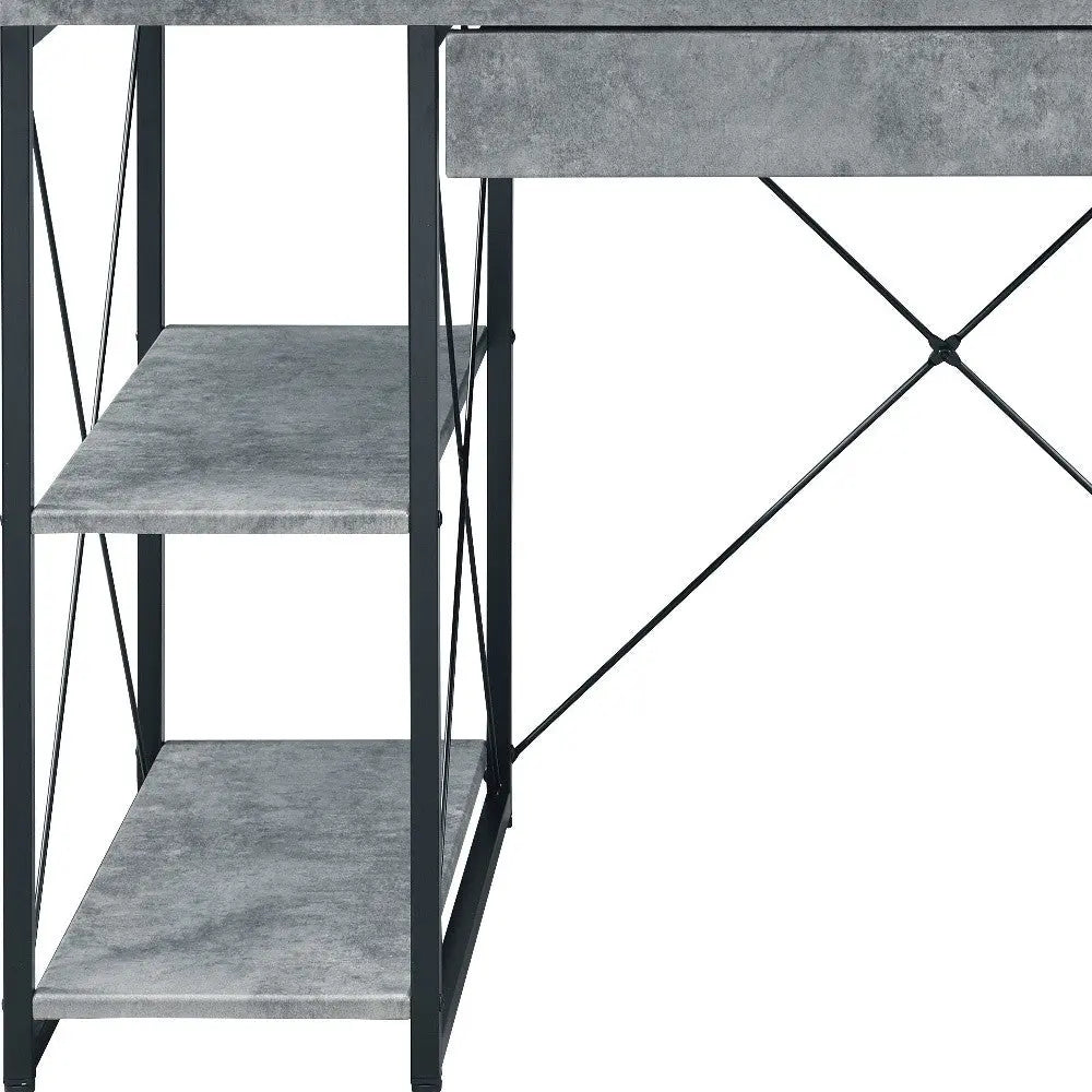 Stylish gray metal desk with concrete finish and open shelves, perfect for modern home office décor.