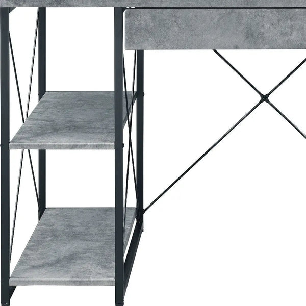 Stylish gray metal desk with concrete finish and open shelves, perfect for modern home office décor.