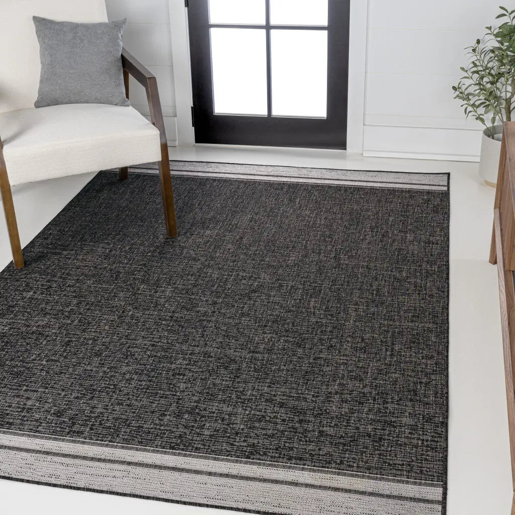 4' X 6' Black And Cream Indoor Outdoor Area Rug - GreatEagleInc