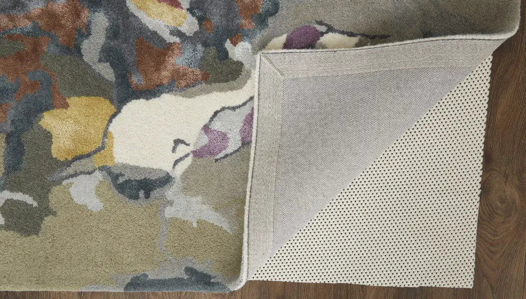 Multicolor floral area rug with plush texture and non-slip backing, perfect for modern home decor.