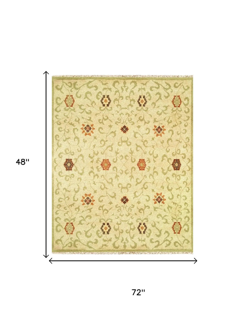 4' X 6' Tan Green And Orange Wool Floral Hand Knotted Area Rug With Fringe Homeroots Home Decor