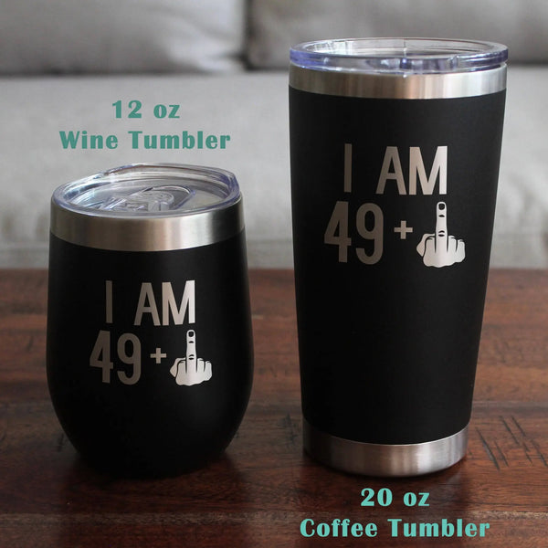 Black stainless steel wine and coffee tumblers with "I AM 49+" engraving, 12 oz and 20 oz sizes.