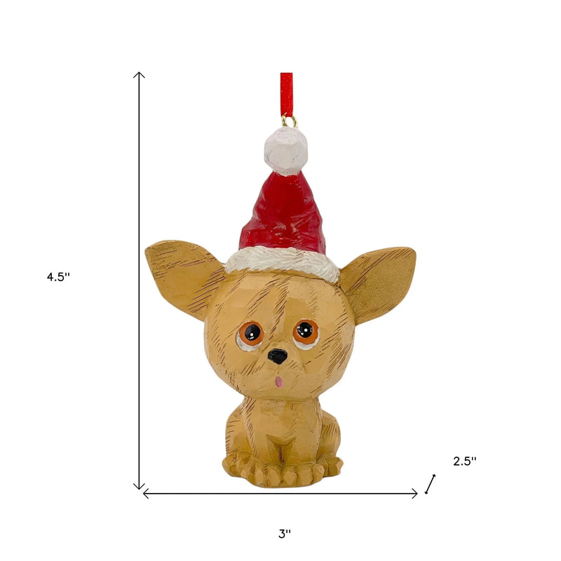 Charming Chihuahua ornament, 4.5" tall, hand-painted wood with red Santa hat, perfect for holiday decor.