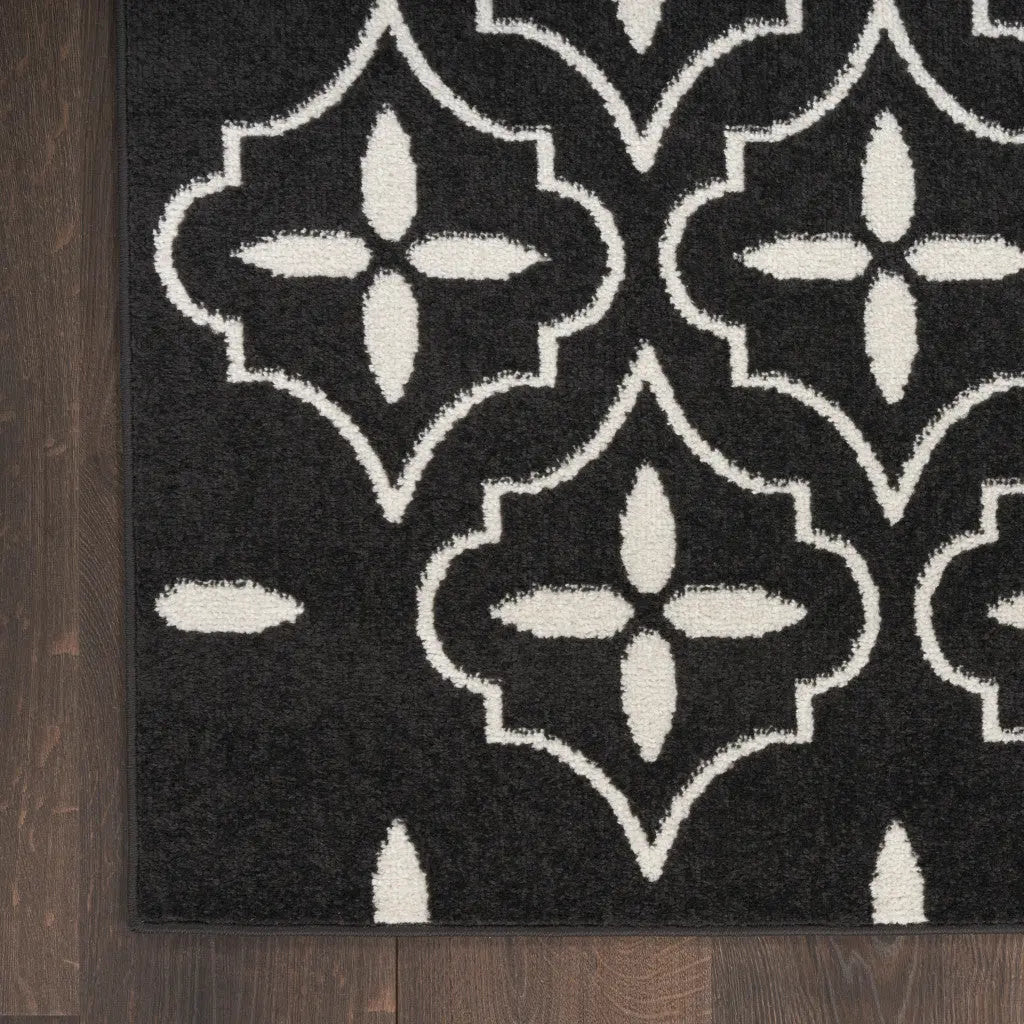 5' X 7' Black And Ivory Geometric Indoor Outdoor Area Rug Homeroots Outdoor