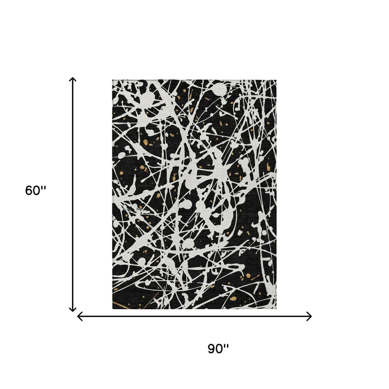 5' X 8' Black And Ivory Abstract Washable Indoor Outdoor Area Rug Homeroots Outdoor