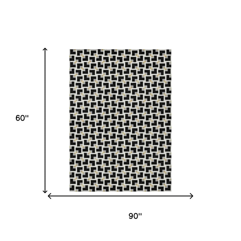 5' X 8' Black And Ivory Geometric Washable Indoor Outdoor Area Rug Homeroots Outdoor
