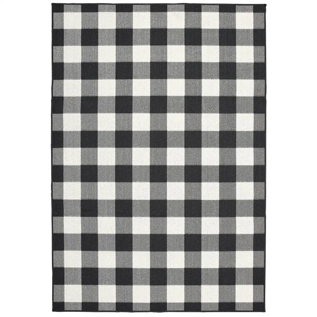 5' X 8' Black And Ivory Indoor Outdoor Area Rug Homeroots Outdoor