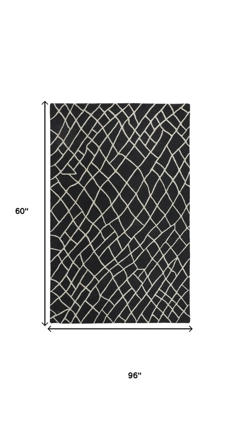5' X 8' Black And Ivory Wool Geometric Hand Tufted Area Rug Homeroots Home Decor