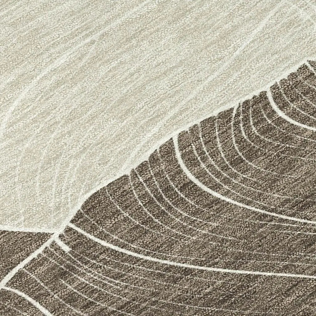 Beige and brown abstract area rug with textured waves design, perfect for modern home decor.